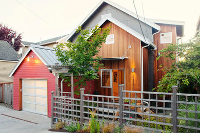Mid-sized trendy two-story wood gable roof photo in Seattle