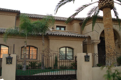 Mediterranean exterior home idea in San Diego