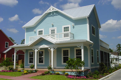 Large traditional blue two-story concrete fiberboard gable roof idea in Miami