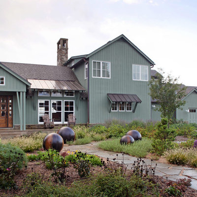 Farmhouse green exterior home photo in Omaha