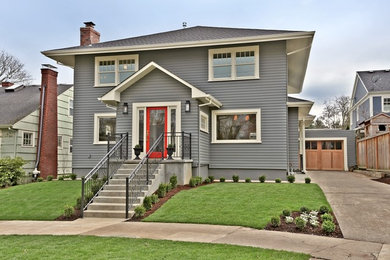 Example of a mid-sized transitional gray two-story wood exterior home design in Portland