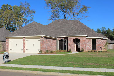Example of an exterior home design in Jackson