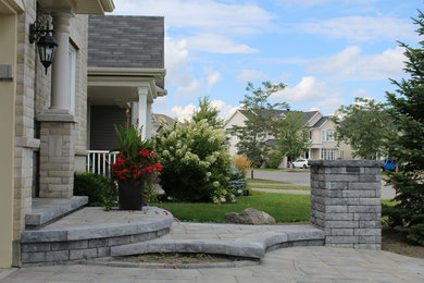 Mid-sized modern exterior home idea in Ottawa