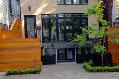 Example of a minimalist exterior home design in Toronto