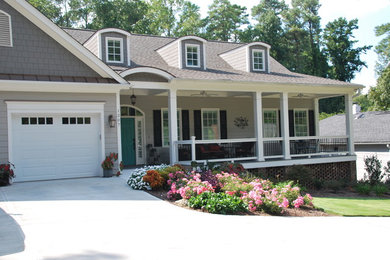 Inspiration for a timeless two-story exterior home remodel in Raleigh