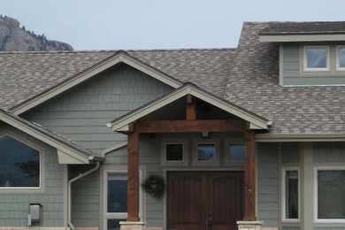 Example of an arts and crafts exterior home design in Denver