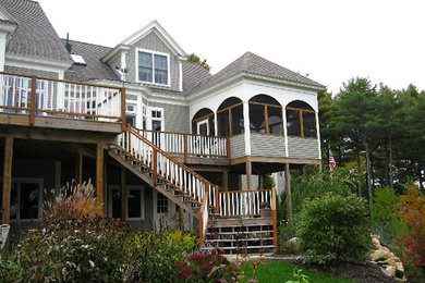 Inspiration for a large gray two-story exterior home remodel in Portland Maine