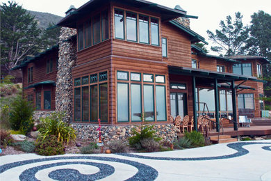 Inspiration for a large craftsman brown two-story wood exterior home remodel in San Luis Obispo with a gambrel roof