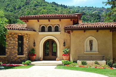Example of a tuscan exterior home design in Philadelphia