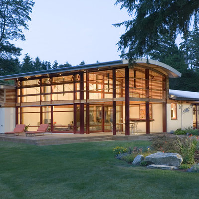 Mid-sized trendy white one-story mixed siding exterior home photo in Seattle