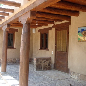 Garden portal, ponderosa pine vigas, beams and corbels after restoration