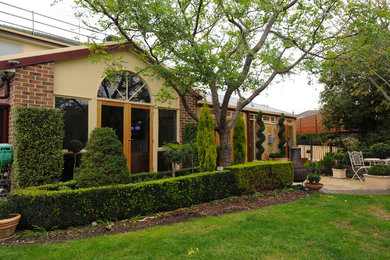 Example of a classic exterior home design in Melbourne