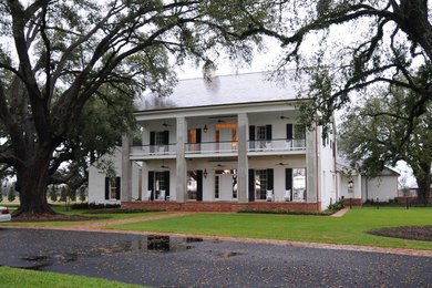 Inspiration for a farmhouse exterior home remodel in New Orleans