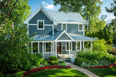 Traditional blue two-story concrete fiberboard exterior home idea in Chicago