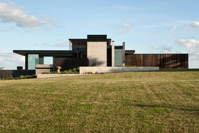 Imagen de fachada de casa contemporánea grande de dos plantas con tejado plano