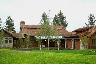 Inspiration for a rustic brown one-story mixed siding exterior home remodel in Boise