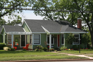 Mid-sized cottage green one-story wood exterior home photo in Dallas