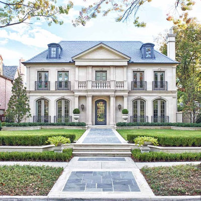 Inspiration for a country three-story exterior home remodel in Dallas