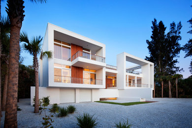 Contemporary white two-story exterior home idea in Tampa