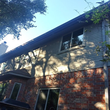 Gutter System Installation on Red Brick House in Kingsland, TX