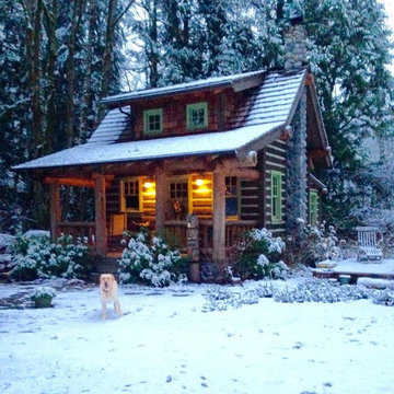 Hand Hewn Log Siding Cabin in Winter.
