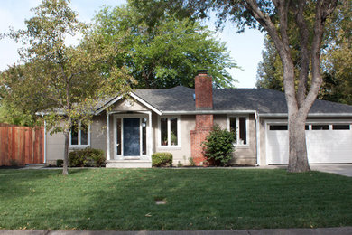 Inspiration for a transitional beige one-story exterior home remodel in San Francisco