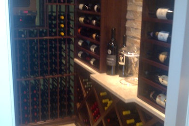 Inspiration for a transitional wine cellar remodel in New York