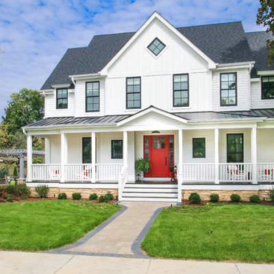 Transitional white two-story gable roof photo in Chicago