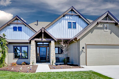Inspiration for a traditional bungalow house exterior in Boise with mixed cladding.