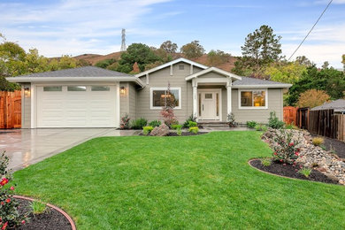 Mid-sized transitional gray one-story wood exterior home photo in San Francisco with a hip roof