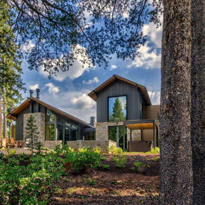 Large minimalist gray three-story mixed siding exterior home photo in Sacramento