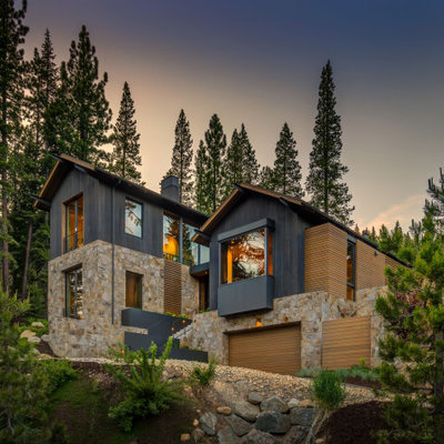 Large minimalist gray three-story mixed siding exterior home photo in Sacramento