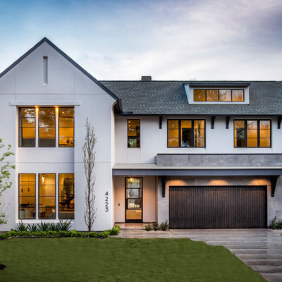 Transitional white two-story exterior home idea in Houston with a shingle roof