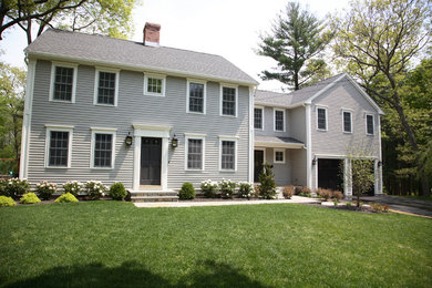 Large traditional gray two-story concrete fiberboard gable roof idea in Boston