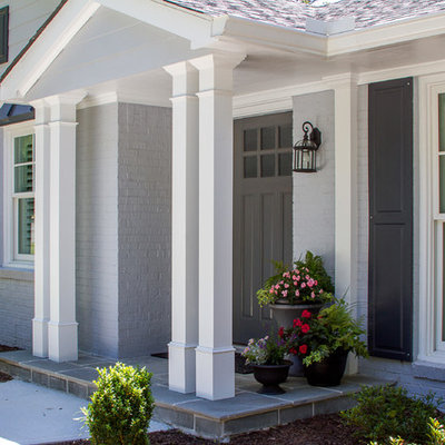 Mid-sized elegant gray two-story brick exterior home photo in Atlanta with a shingle roof