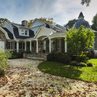 Example of a classic stone exterior home design in New York