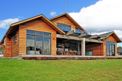 Design ideas for a traditional house exterior in Auckland.