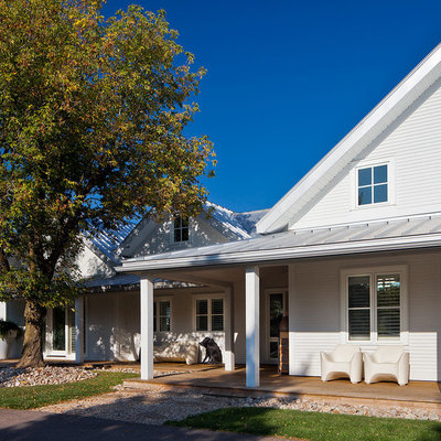 Inspiration for a country wood exterior home remodel in Toronto