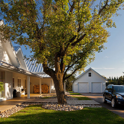 Country wood exterior home photo in Toronto