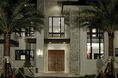 Contemporary white two-story exterior home idea in Miami