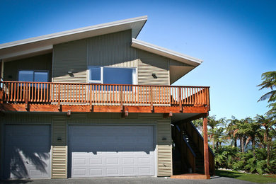 Photo of a beige modern two floor house exterior in Other.