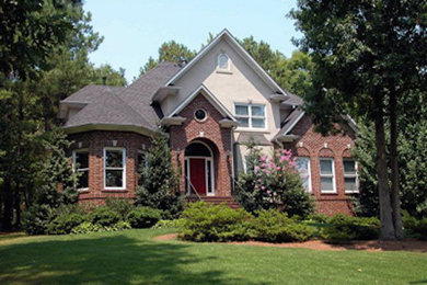 Design ideas for a traditional house exterior in Birmingham.