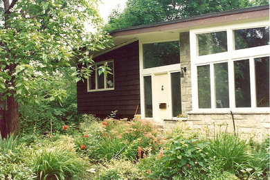 Example of an exterior home design in Toronto