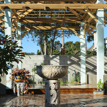 Home Exterior Renovation, Neptune Beach, Florida - Balinese fountain and pergola