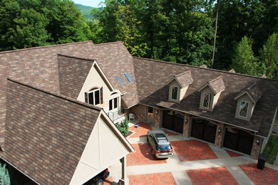 Inspiration for a transitional gable roof remodel in Other