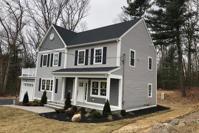 Example of a cottage chic exterior home design in Boston