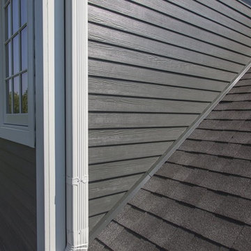 Home transformed with James Hardie Iron Gray Siding & new windows in Wheaton IL