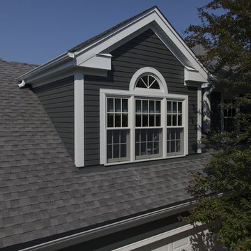 Home transformed with James Hardie Iron Gray Siding & new windows in Wheaton IL