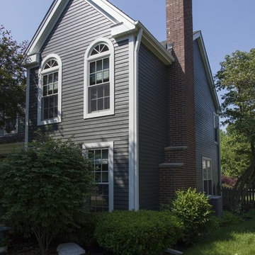 Home transformed with James Hardie Iron Gray Siding & new windows in Wheaton IL