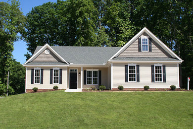 Large elegant beige two-story mixed siding gable roof photo in Richmond